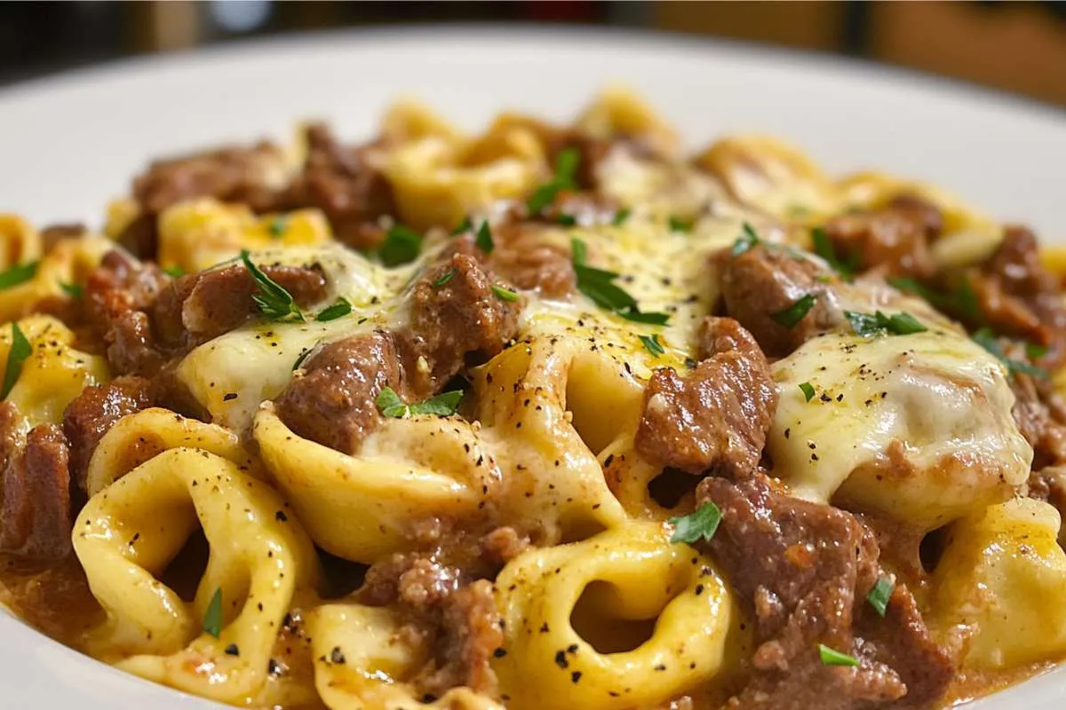 cheesesteak tortellini in rich provolone sauce