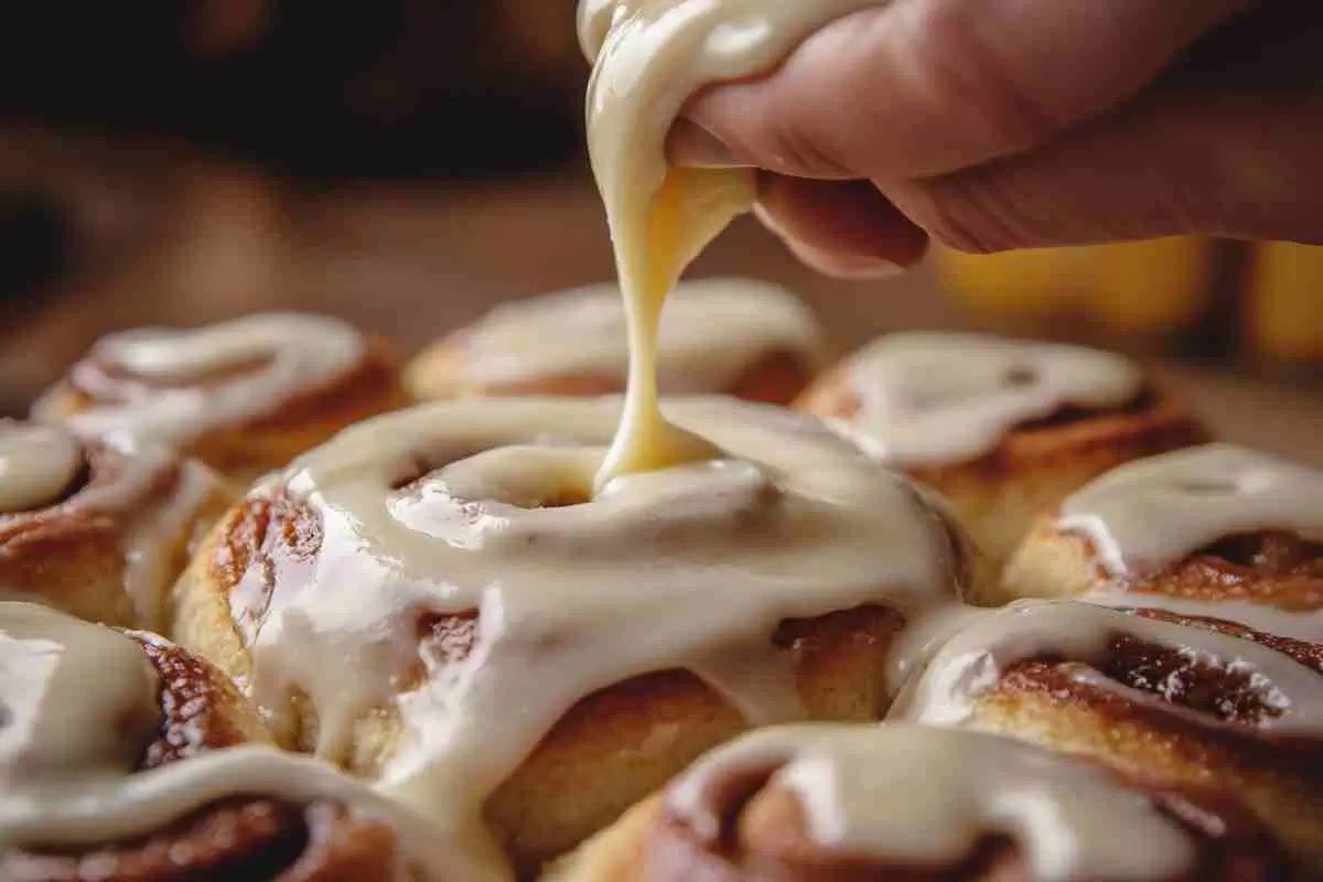 Freshly baked sourdough discard cinnamon rolls with frosting